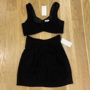 high waisted black skirt with cropped black top